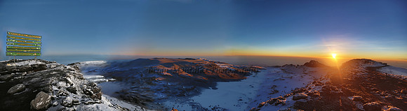 We made it!  Panorama of crater and summit ridge of Mt.Kilimanjaro.
