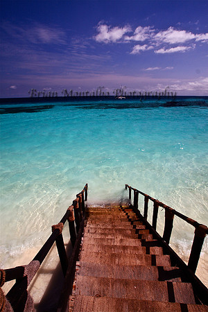 Stairs on Island of Zanzibar. Imagine yourself walking down this on a cold winter night!