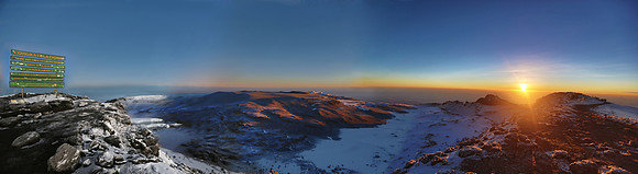 We made it!  Panorama of crater and summit ridge of Mt.Kilimanjaro.