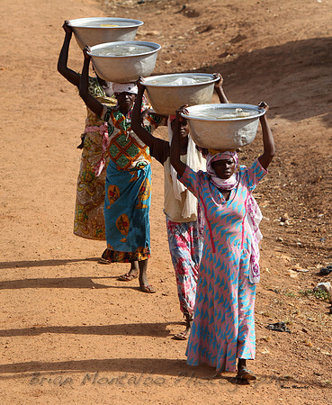 Mali.  Next time you take a bath think of these woman having to carry there water miles.
